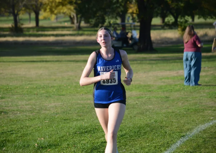 Christenson claims fourth in conference meet